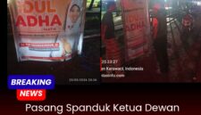 Spanduk yang diduga tidak berizin terpasang di trotoar taman pisang.