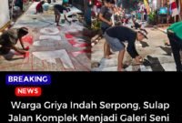 Warga Griya Indah Serpong sedang melukis jalan menjadi perlombaan.